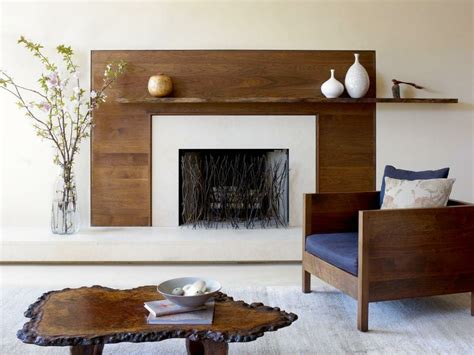 Fireplaces are the heart of the home, standout focal points of any room, and practically scream comfy winter night, bundled on the couch with wine and a good movie. 3 Best Ways to Decorate a Modern Fireplace Mantel | Decorilla