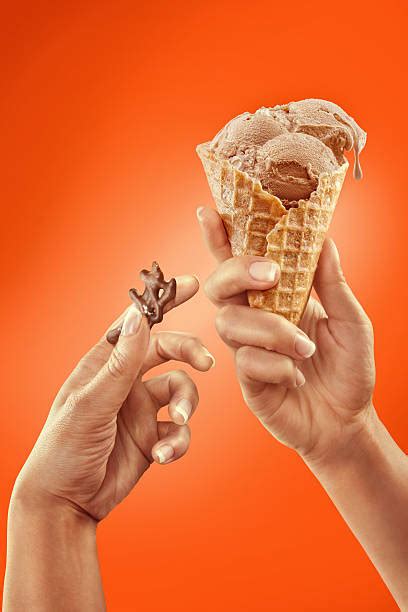 Hand Holding Ice Cream Cone Isolated Stock Photos Pictures And Royalty