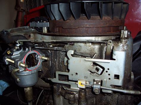 Where does the governor spring connect to on a 12.5 hp briggs and