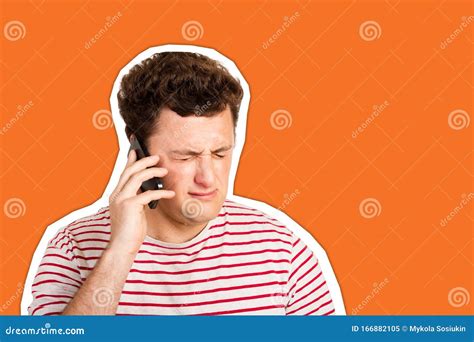 Young Man Crying Over The Bad News He Is Receiving On His Phone