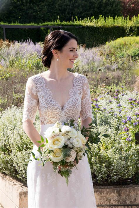 Check spelling or type a new query. Bride in Lace Dress Holding Bouquet