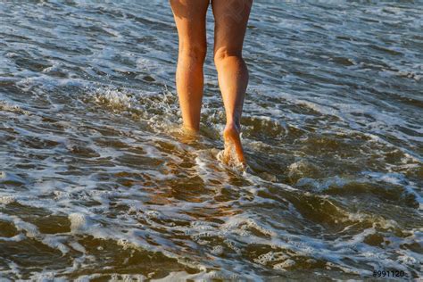 Beautiful Woman Legs On The Beach Stock Photo 991120 Crushpixel