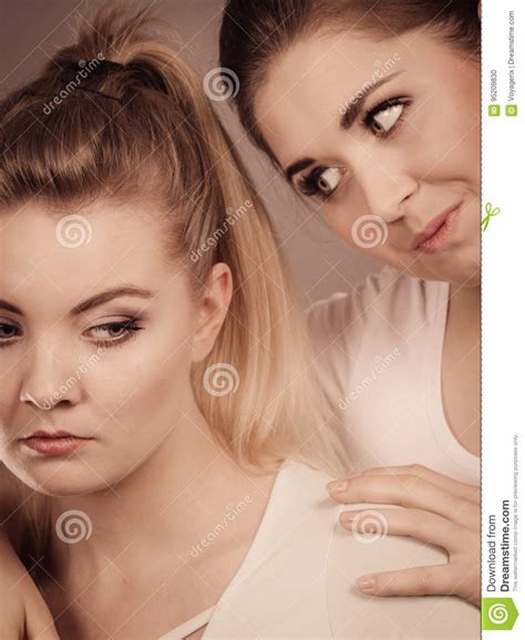 Woman Hugging Her Sad Female Friend Stock Photo Image Of Unhappy