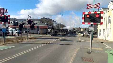 Steam Trains Crossing The Road Bridge In Porthmadog Youtube