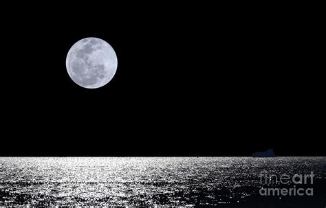 Full Moon Over Water Photograph By Sarun T