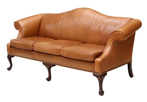 Tufted leather camelback sofa, with chippendale style base. ETHAN ALLEN CAMEL BACK LEATHER SOFA