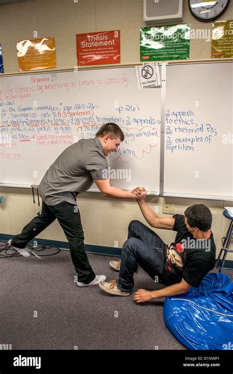 Two California Ebullient High School Students Arm Wrestle During An