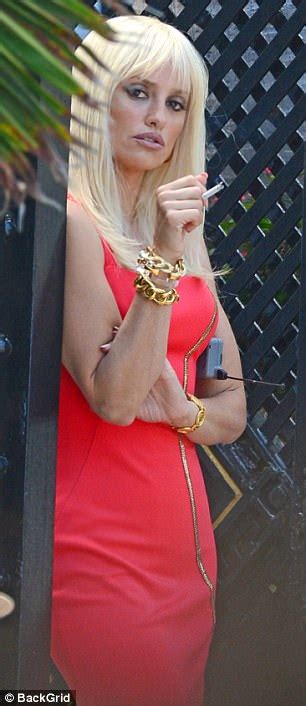 Penelope Cruz Channels Donatella Versace In Red Dress Daily Mail Online