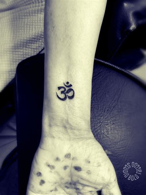 Pin By Bold Tattoo And Body Piercing On Om Tattoo Hindu Holly Symbols