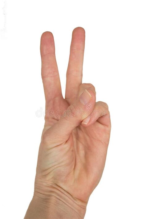 White Woman`s Hand With Two Fingers Up In Peace Or Victory Symbol