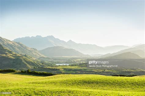 Rolling Hills In Rural Landscape Queenstown South Island New Zealand