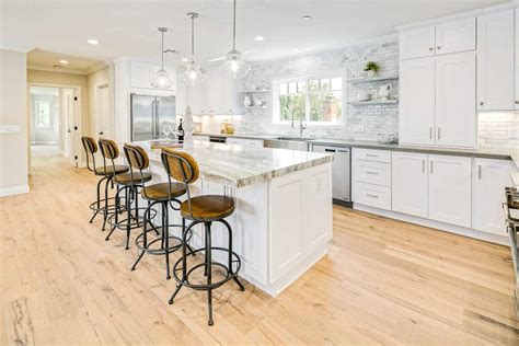 Sustainable kitchens it is not unusual to see slab drawer fronts in kitchens with shaker cabinets. White Shaker RTA Cabinets - Cabinet City Kitchen and Bath