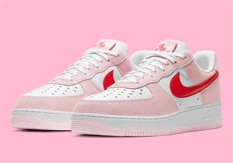 A dainty red heart encapsulated in a silver outline adorns the side of each sneaker. Valentine's Day Nike Air Force 1 Love Letter DD3384-600 ...