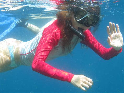 Download Snorkeling Waving To The Camera Wallpaper
