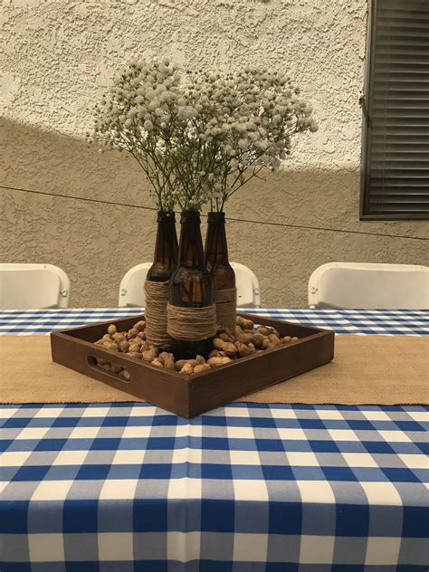 Maybe you would like to learn more about one of these? Beer bottle centerpieces. Cheers and beers to 30 years ...