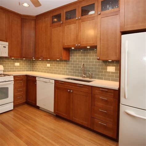 This beautiful evolution of color is one of the most sought after qualities of the cherry wood kitchen cabinets. Cabinet color and backsplash colors - Light wood floors ...