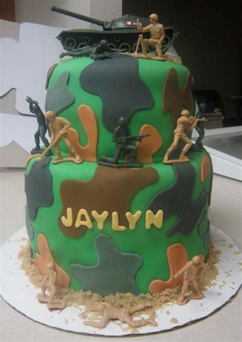 Decorated in fondant, gumpaste, crushed cookies and chocolate. Military Two Tiered Camouflage Cake Tiph designed for a ...