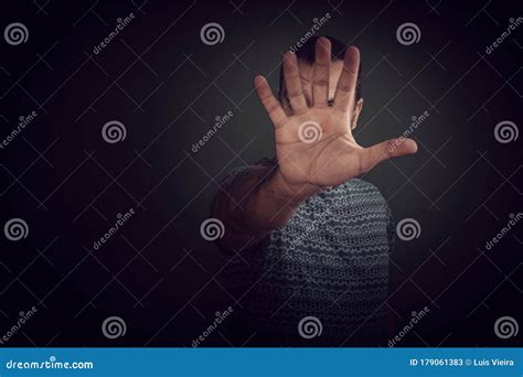 A Man With His Hand In Front Of His Face Stock Image Image Of