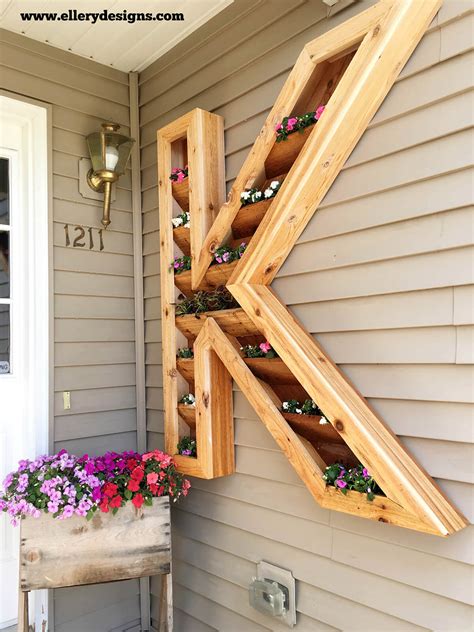 And go to her site to check out how she turned one of them into a house number planter. 32 Best DIY Pallet and Wood Planter Box Ideas and Designs ...