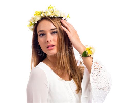 Beautiful Woman With A Flower Garland And A White Dress Stock Photo