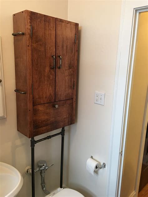 This bathroom cabinet can be hung on the wall or stand on the table, which can greatly reduce the installation space. Bathroom cabinet over the toilet cabinet. This was built ...