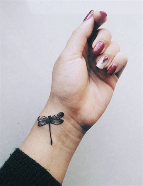 Wrist tattoo that wraps right around the arm is sometimes referred to as bracelet tattoos. Pin on :: Tattoos