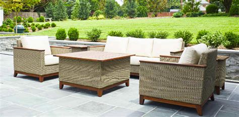 A fire pit is a fantastic addition to any yard. Wood And Woven Patio Furniture Design From Jensen Leisure