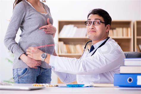 Pregnant Woman Visiting Doctor For Consultation Stock Image Colourbox