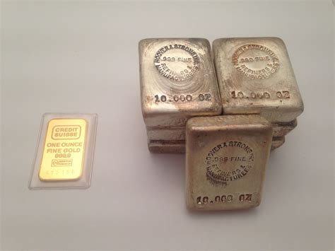1 Oz Gold Bar With Its Equal Value Weight In Silver Bars