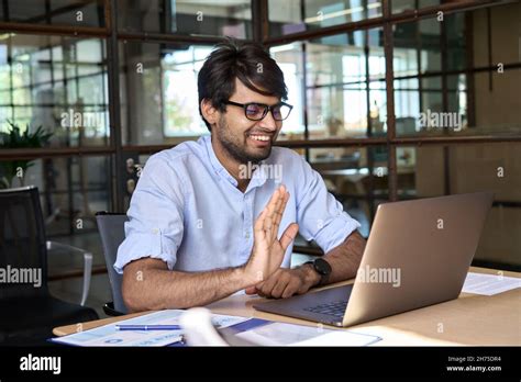 Indian Manager Teacher Or Coach Leading Virtual Video Call Meeting