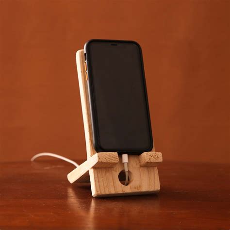 Wooden Phone Stand Who We Are