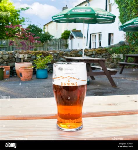 Pint Of Beer On A Beer Garden Table In A Pub In The Lake District Uk