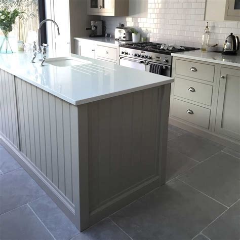 Tile floors are a natural choice for kitchens. Limestone is proving more and more popular for a stone kitchen floor
