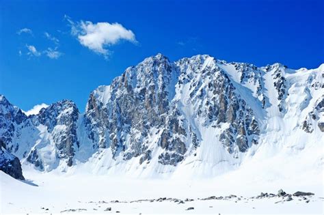 Blue Sky Over Snowy White Mountains Stock Image Image Of Purple
