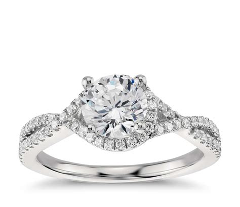 Buying an engagement ring is a big decision and not just because of the cost. Twisted Halo Diamond Engagement Ring in Platinum (1/3 ct ...