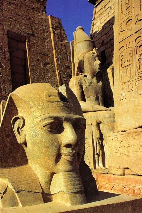 One Of Two Colossi Depicting King Ramesses Ii Seated On His Throne