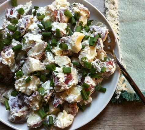 The only real defining attributes of a potato salad are potatoes (naturally) and some sort of dressing. Potato Salad with Dill Chive Yogurt Dressing {Mariano's Grocery Store Chicago} - A Cedar Spoon