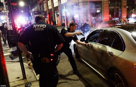 Cops Clash With Protesters And Cars Are Set On Fire On Sixth Night Of