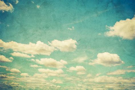 Grunge Blue Sky And White Clouds With Vintage Effect Stock Photo
