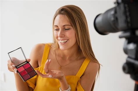 Free Photo Female Blogger Filming Makeup Tutorial