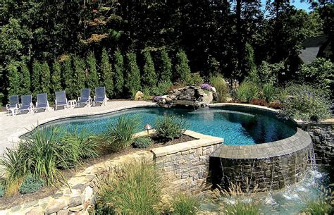 Whether it's our aquascape swimming pools, landscaping, garden ponds, waterfalls, hot tubs, night lighting or outside fireplaces our staff has the unique knowledge to bring together all these aspects and create your personal outdoor haven! Pool by Aquascape | Garden swimming pool, Pool designs ...