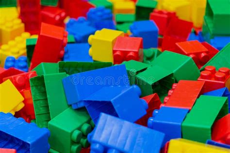 Multicolored Plastic Building Blocks Background Of Bright Plastic