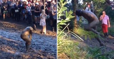 naked festival dancer covered in mud takes embarrassing tumble as hundreds watch mirror online