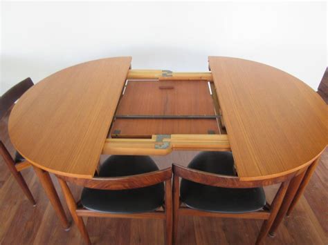 But introduce table top thickness. Rare Hans Olsen Teak Table with Leaf and Six Chairs That ...