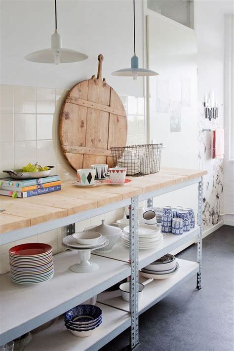 The metal pipe shelves are mostly to build in the same manner, but you can vary the tone of wood shelving boards to give amazing variations to them. Five industrial metal shelving | Home kitchens, Kitchen ...