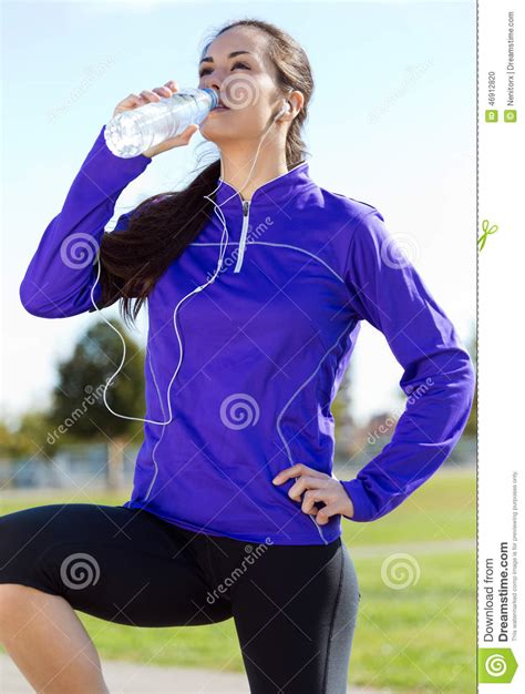 Pretty Young Woman Drinking Water After Running Stock Photo Image Of