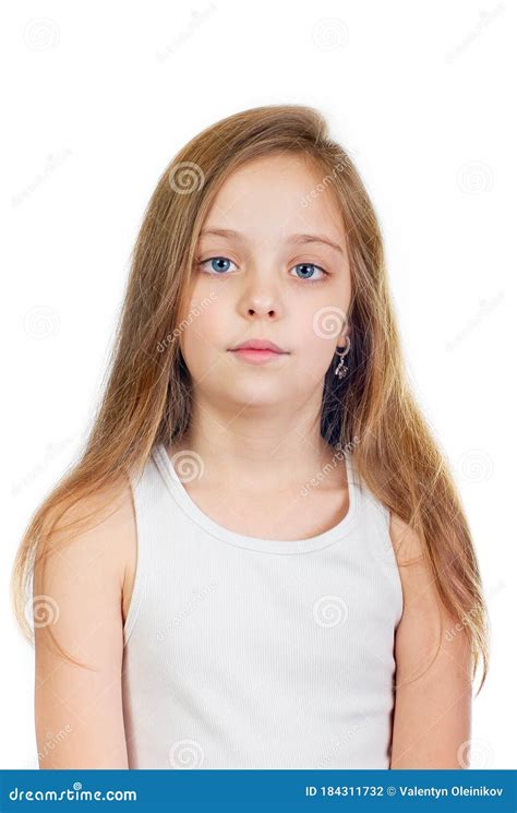Young Cute Serious Girl With Grey Blue Eyes And Long Light Brown Hair