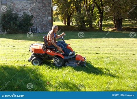 Man Driving A Red Lawn Mower Tractor Royalty Free Stock Image Image