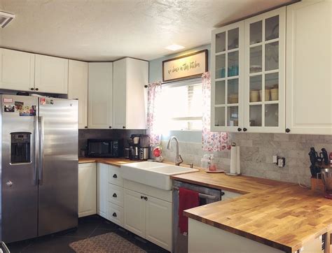 Here's what you need to know first. Farmhouse kitchen remodel . DIY IKEA kitchen cabinets and butcher block counter..., #… in 2020 ...