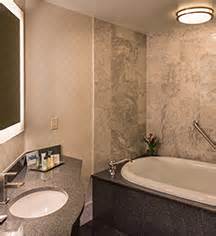 This hotel offers spacious suites with private hot tubs! King Room With Whirlpool at Hilton St. Louis Downtown at ...